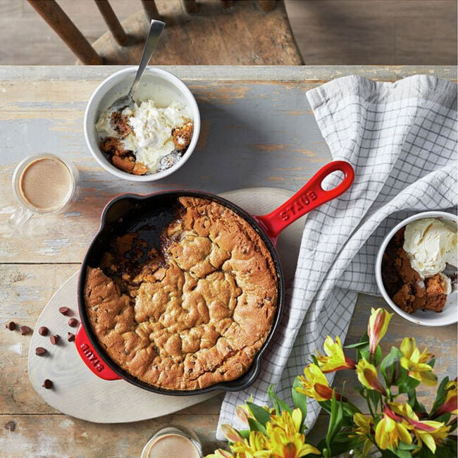 Staub Cast Iron  8.5-inch, Traditional Deep Skillet | Cherry with food	