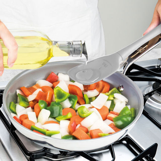 Tovolo All-Silicone Deep Spoon | Oyster Gray in use