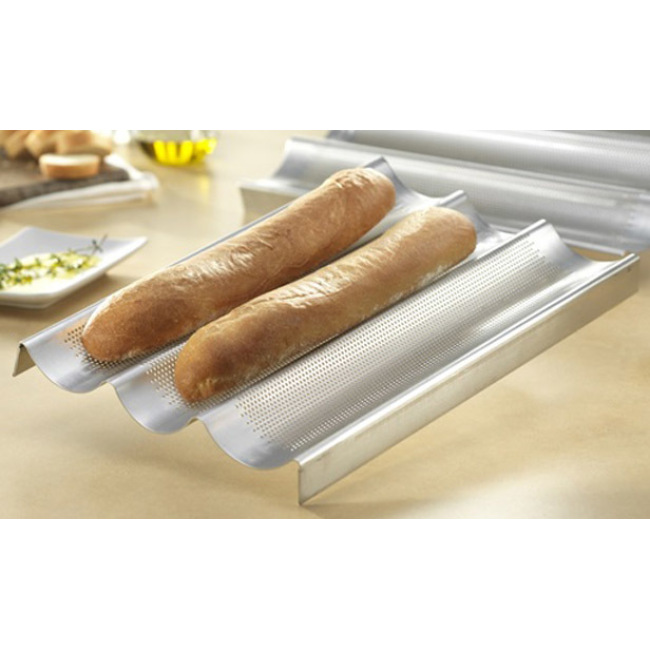 USA Pan Commercial French 3-Loaf Baguette Pan in use