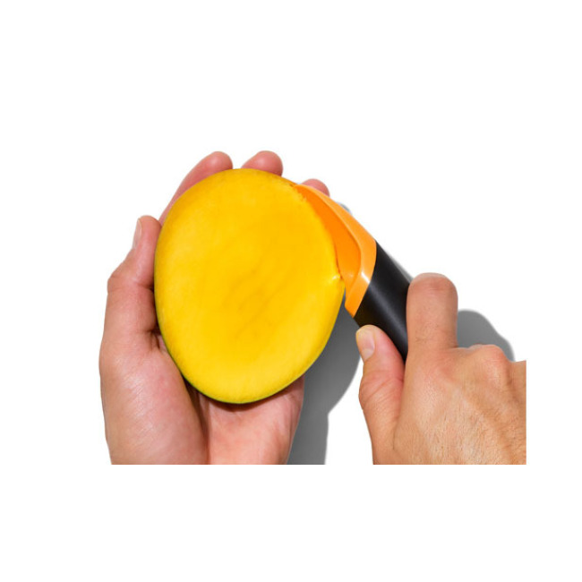 OXO Good Grips Mango Slicer With Scoop in use