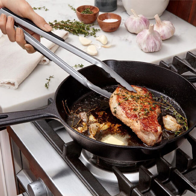 OXO Good Grips 12-in. Stainless Steel Tongs in use