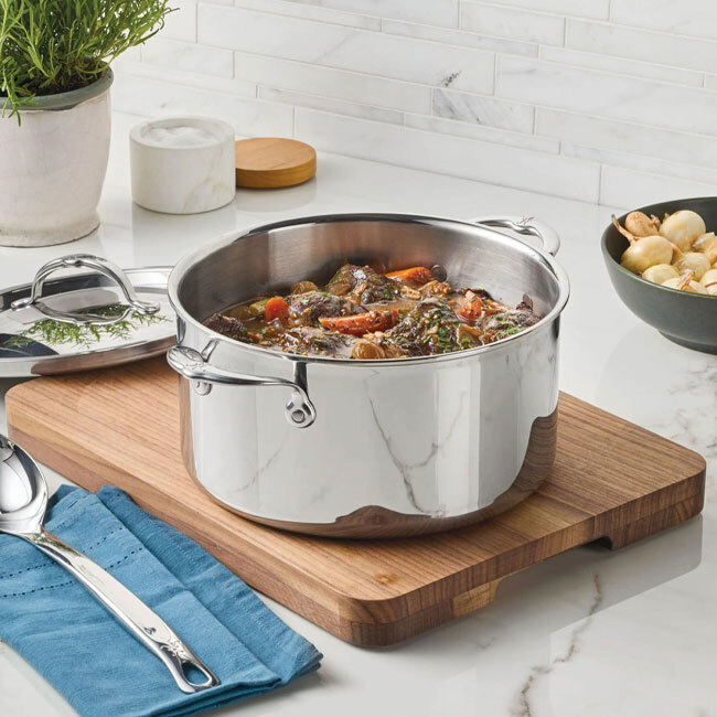 Hestan ProBond® Luxe™ Polished Clad Stainless Steel 8 Qt. Stockpot w/Lid in use