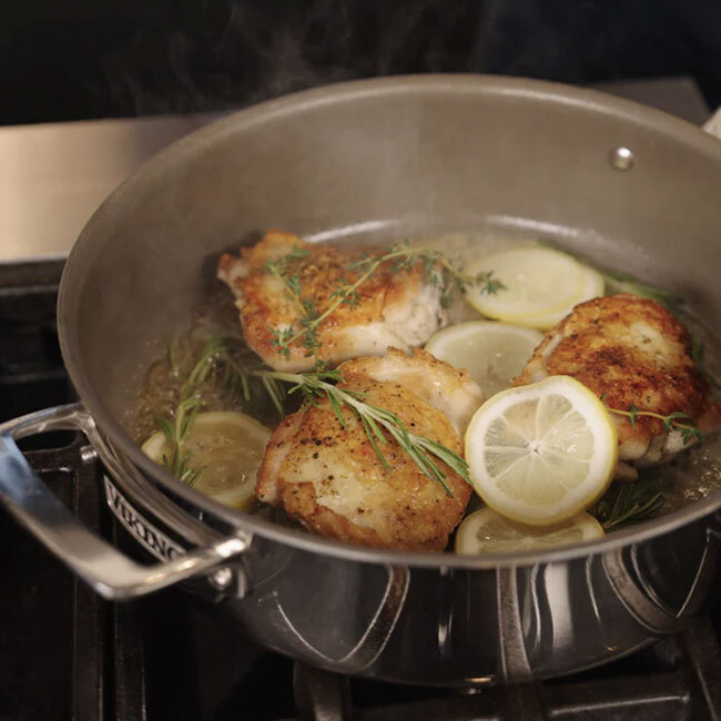VIKING Pureglide Pro 3-Ply 4.5 Qt. Sauté Pan with Metal Lid in use