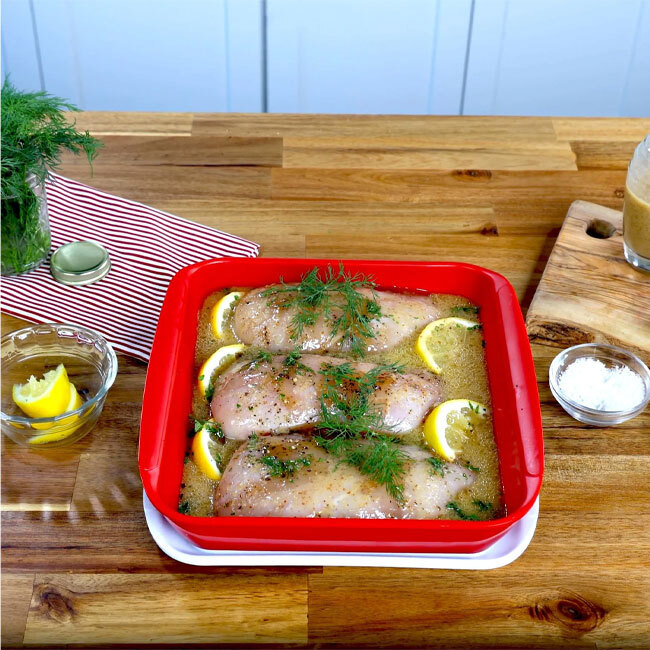Tovolo Marinade Tray - 10.5” | Red in use