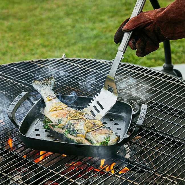 Le Creuset Alpine Outdoor Slotted Stainless Steel Turner in use 