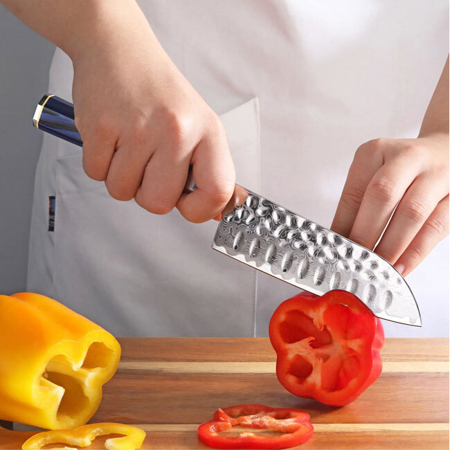 Cangshan KITA Series Blue 5” Santoku Knife in use