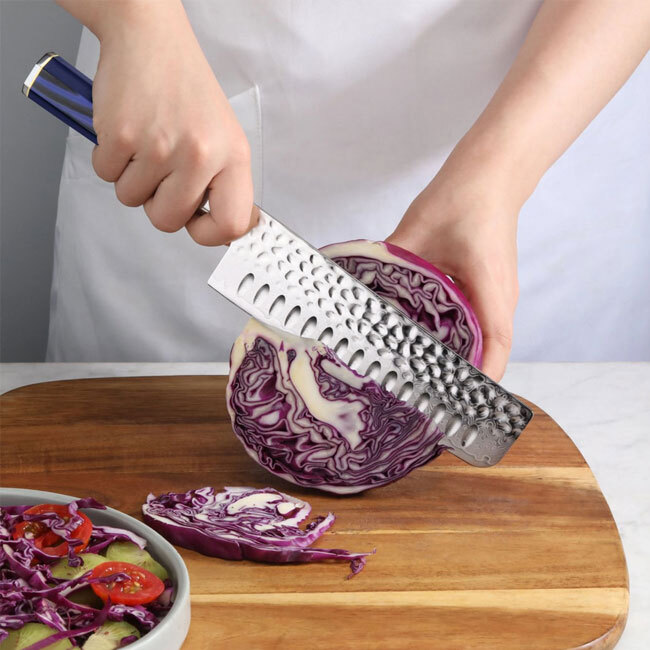 Cangshan KITA Series Blue 7” Nakiri Knife in use