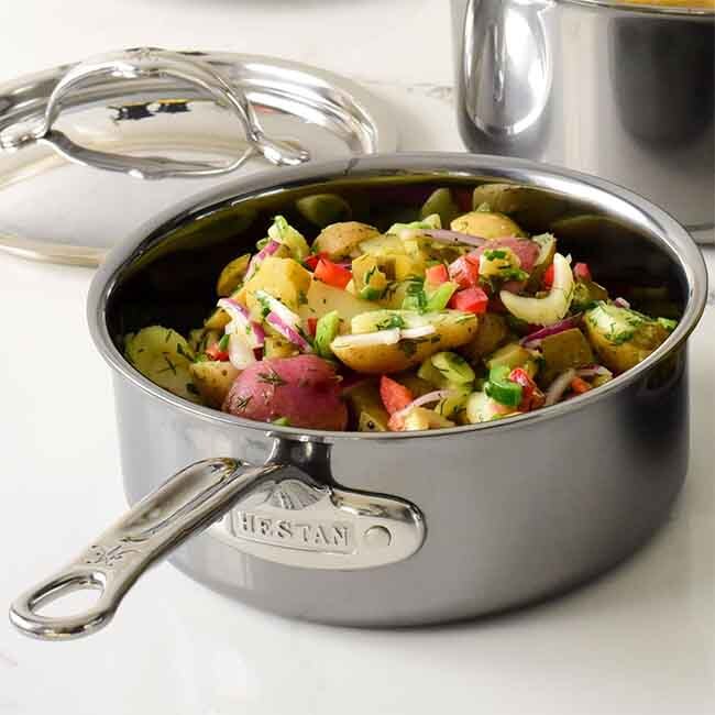 Hestan NanoBond Titanium Stainless Steel Saucepan with Lid, Stainless Steel, 2.0-Quart in use