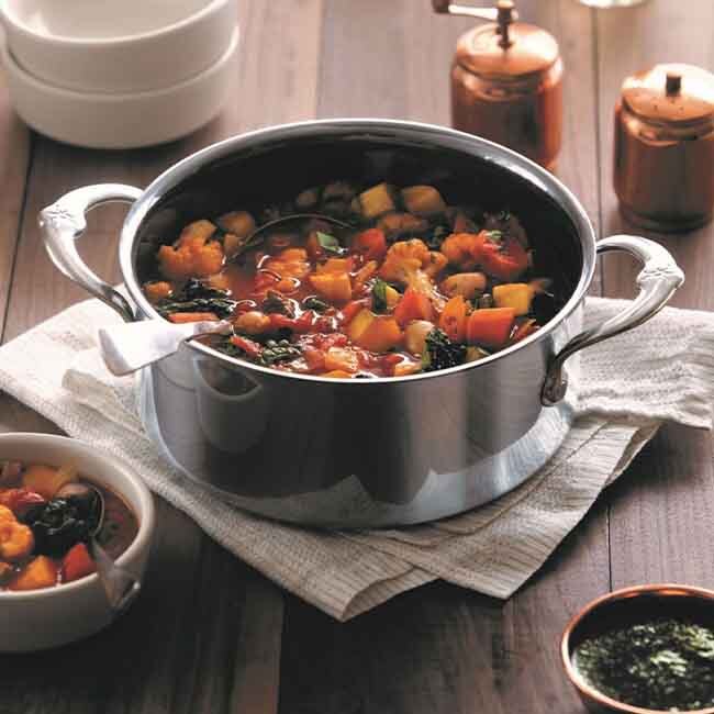 Hestan NanoBond Titanium 3 Qt. Stainless Steel Soup Pot with Lid in use