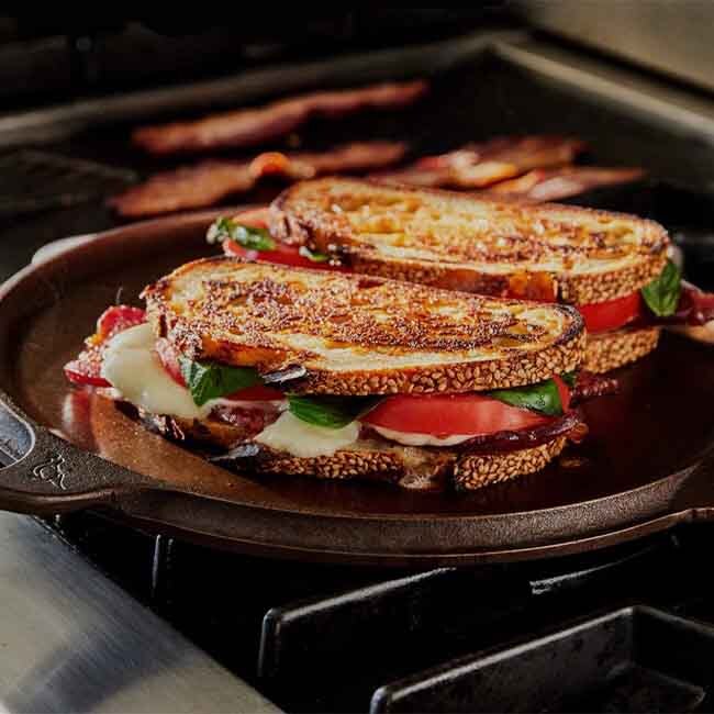 Smithey Ironware No. 10 Cast Iron Flat Top Griddle, 10-Inch in use