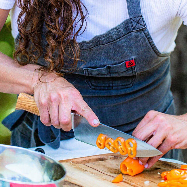 Messermeister Oliva Elite Magnet Block Set | 6 Piece - Chef's Knife in use