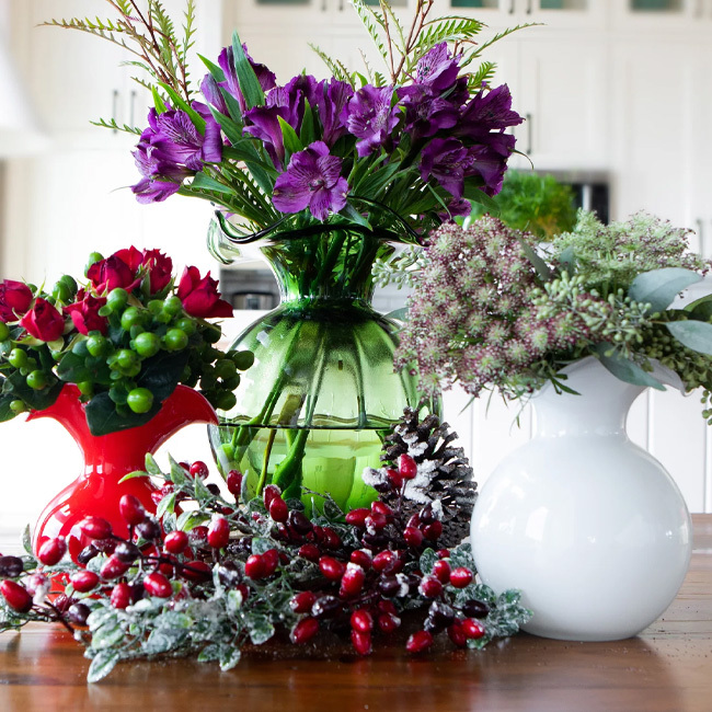 Vietri Hibiscus Glass Medium Fluted Vase | Dark Green in situ