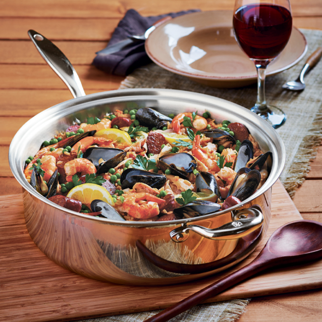Heritage Steel 'Titanium Series' 8 Qt. Family Sauté Pan with Lid in use