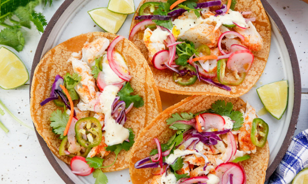 Grilled Fish Tacos with Lime Crema and Spicy Quick-Pickled Vegetables