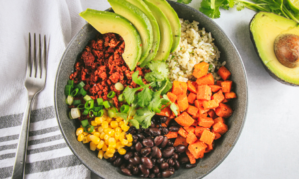 Brown Rice Bowls with Soy Chorizo, Roasted Sweet Potatoes, Black Beans, Corn, Green Onion, and Avocado