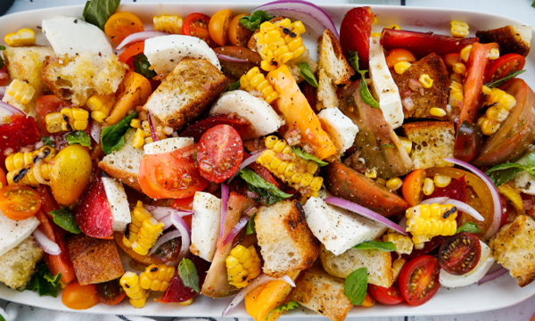 Heirloom Tomato Panzanella with Fresh Basil, Red Plums, and Grilled Corn