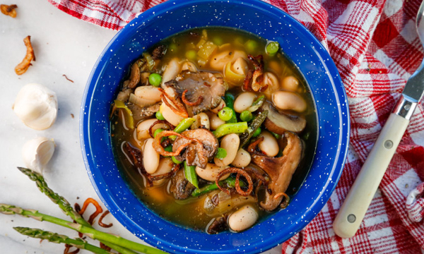 Spring White Bean Soup with Mushrooms, Asparagus and Fried Shallots