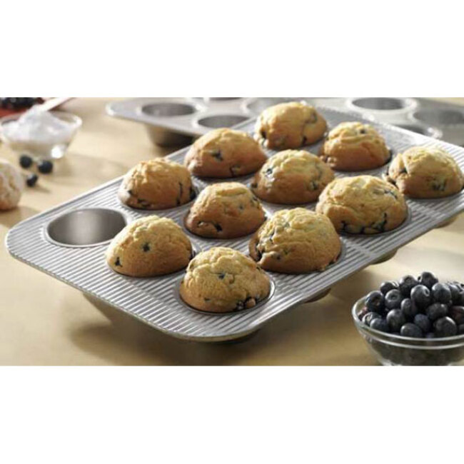 USA Pan Commercial 12-Cup Muffin Pan in use