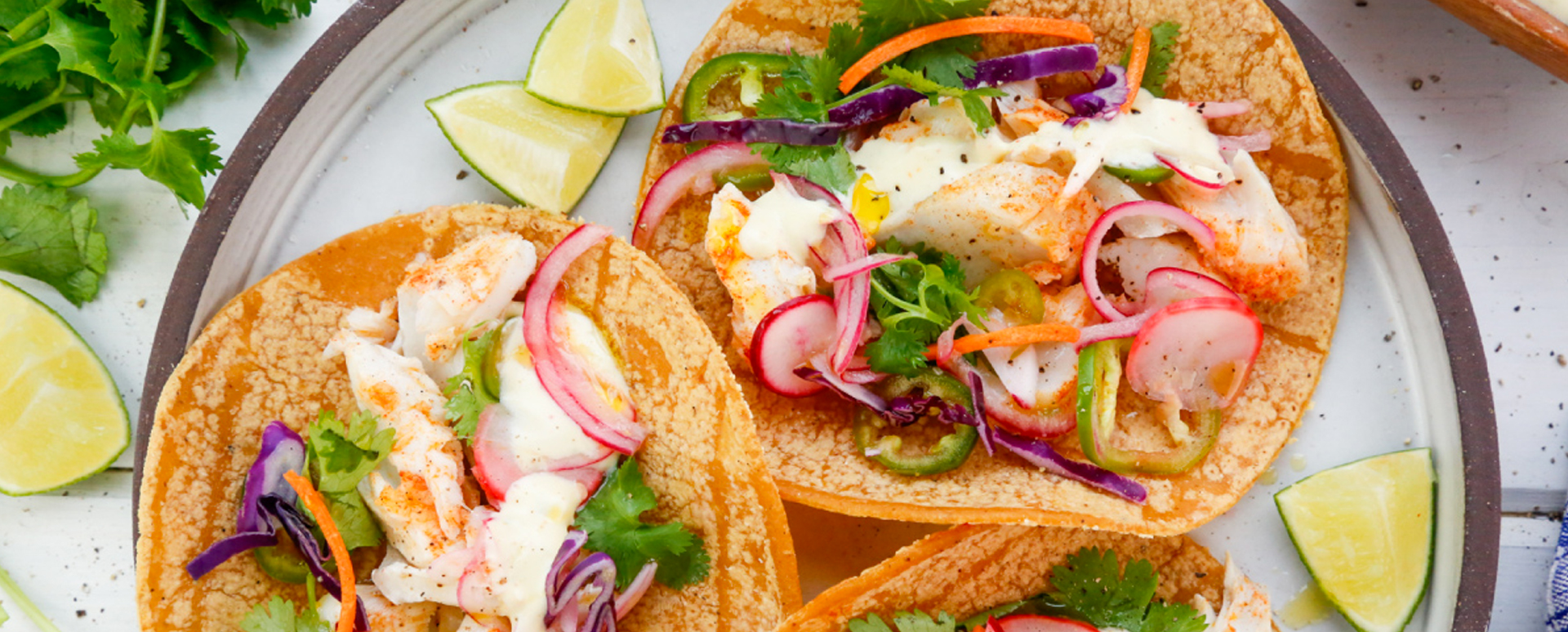 Grilled Fish Tacos with Lime Crema and Spicy Quick-Pickled Vegetables